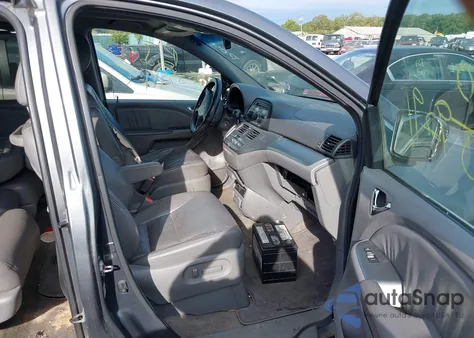 2010 Honda Odyssey Ex-L z USA, uszkodzony, nr VIN 5FNRL3H70AB021452